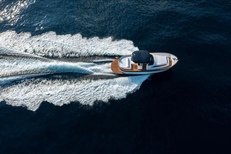  Yacht Photos Pics Aerial view of 2025 Apreamare GOZZO 35 yacht cruising on open water.