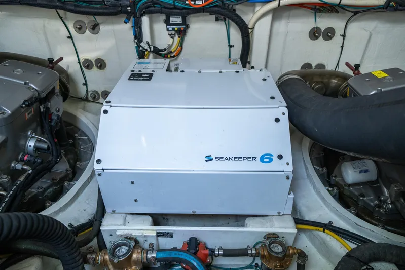 Risky Business Yacht Photos Pics Engine room of 2019 Cruisers Yachts Cantius featuring Seakeeper 6 stabilizer system.