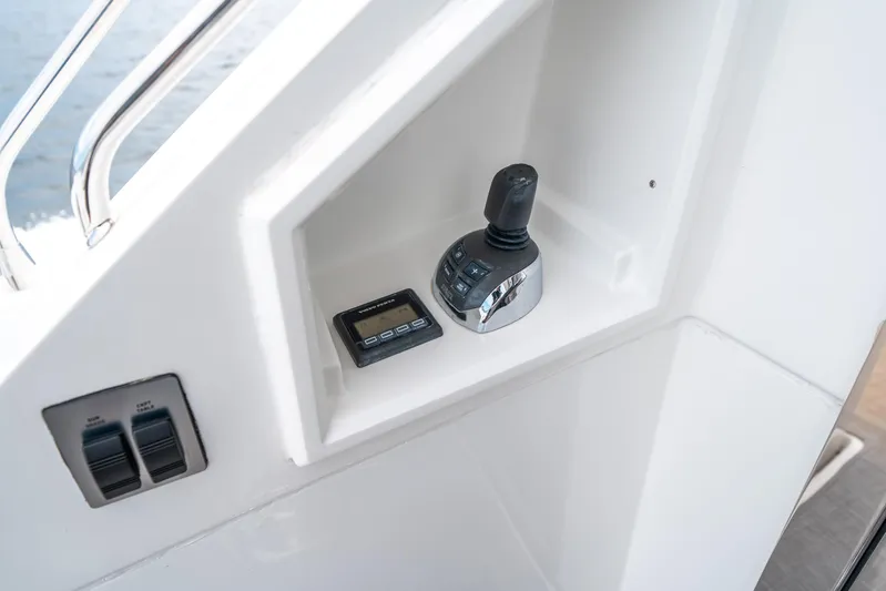 Risky Business Yacht Photos Pics 2019 Cruisers Yachts Cantius control panel with joystick and digital display.