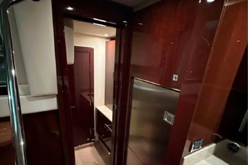  Yacht Photos Pics Interior of 2011 Sea Ray 470 Sundancer yacht with sleek wood finishes.