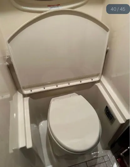  Yacht Photos Pics 2011 Sea Ray 470 Sundancer yacht bathroom with compact toilet design.