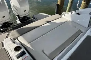  Yacht Photos Pics 2023 Four Winns H350 OB boat with cushioned seating and dual outboard motors.