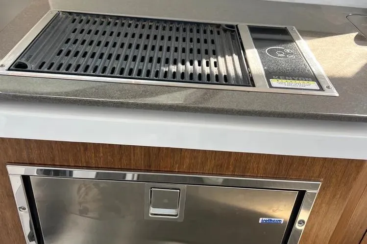  Yacht Photos Pics Outdoor grill and storage on 2023 Four Winns H350 OB boat.