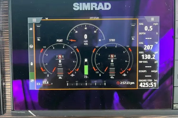  Yacht Photos Pics Simrad display on 2023 Four Winns H350 OB showing engine and fuel metrics.