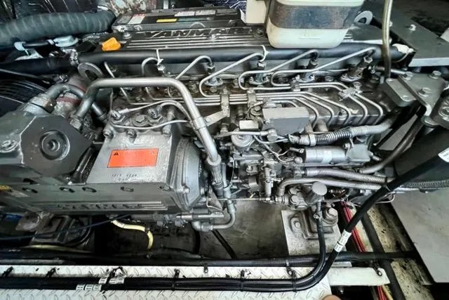 Partner Ship Yacht Photos Pics Engine of 2003 Cruisers Yachts 3772 Express, showcasing intricate mechanical components.