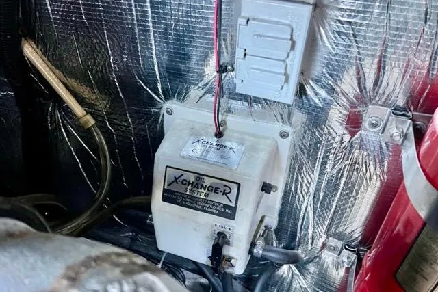 Partner Ship Yacht Photos Pics Oil change system in 2003 Cruisers Yachts 3772 Express engine room.