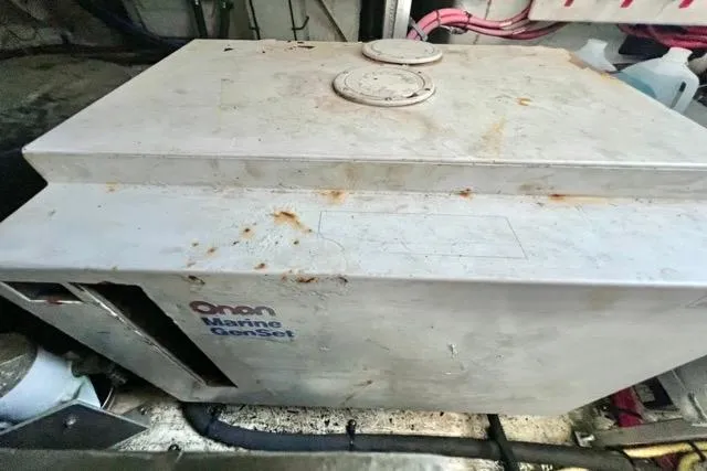 Partner Ship Yacht Photos Pics 2003 Cruisers Yachts 3772 Express Onan Marine GenSet in engine compartment.