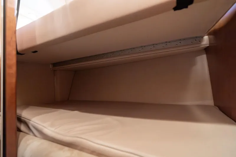 Candykiss Yacht Photos Pics Interior cabin of 2003 Meridian 490 Pilothouse yacht, featuring beige upholstery.