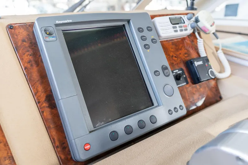 Candykiss Yacht Photos Pics Control panel of a 2003 Meridian 490 Pilothouse yacht with navigation equipment.