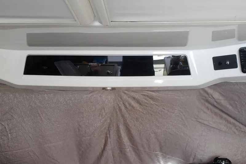 Iffin Yacht Photos Pics 2018 Jeanneau NC 895 interior dashboard with modern controls and sleek design.