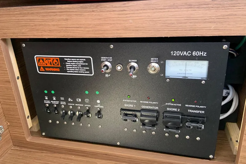 Iffin Yacht Photos Pics Electrical control panel on a 2018 Jeanneau NC 895 boat, featuring 120VAC 60Hz system.