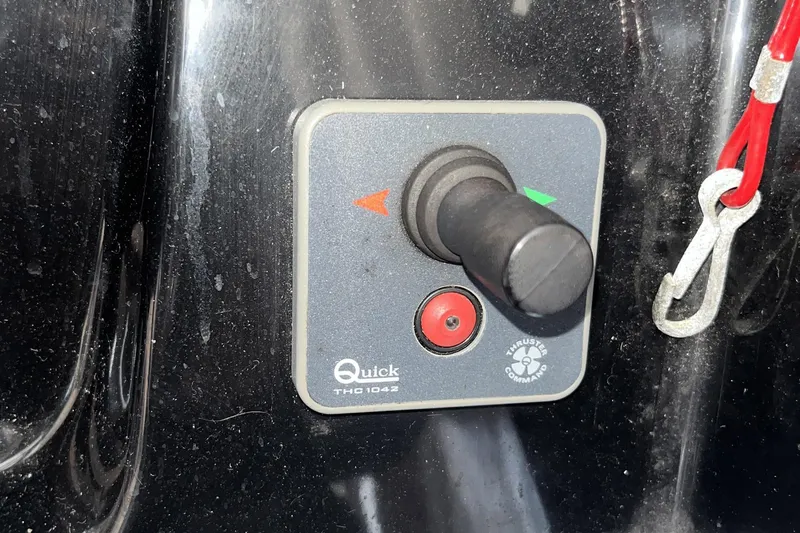 Iffin Yacht Photos Pics Control panel of a 2018 Jeanneau NC 895 boat with joystick and safety clip.