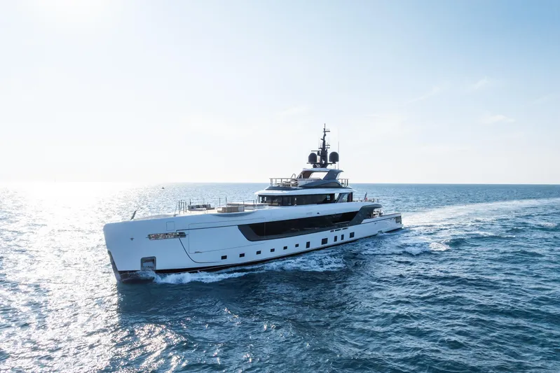 Silver Star I Yacht Photos Pics 2023 Admiral 55 S-Force yacht cruising on open sea under clear sky.