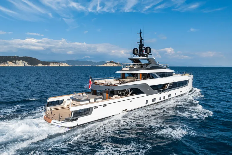 Silver Star I Yacht Photos Pics 2023 Admiral 55 S-Force yacht cruising on open sea under clear blue sky.