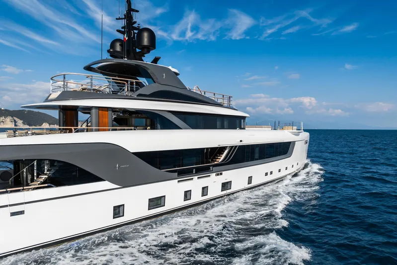 Silver Star I Yacht Photos Pics Luxurious 2023 Admiral 55 S-Force yacht cruising on open sea under clear blue sky.