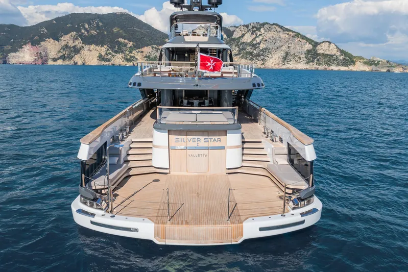 Silver Star I Yacht Photos Pics Luxury Admiral 55 S-Force yacht, 2023 model, cruising in scenic coastal waters.