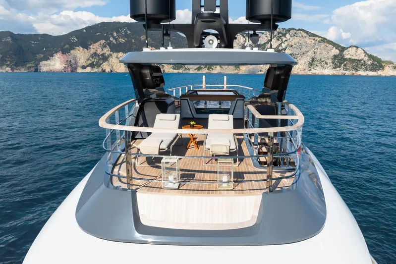 Silver Star I Yacht Photos Pics 2023 Admiral 55 S-Force yacht on serene blue waters with scenic mountain backdrop.