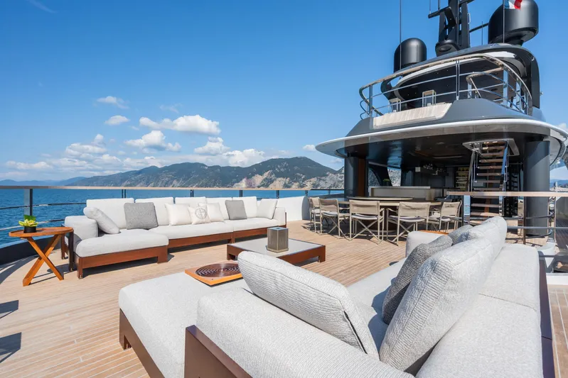 Silver Star I Yacht Photos Pics Luxurious 2023 Admiral 55 S-Force yacht deck with elegant seating and scenic ocean view.