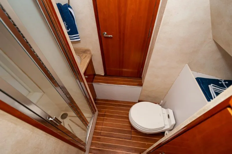 Moontan Yacht Photos Pics 2002 65 Hatteras Convertible Moontan Crew Head