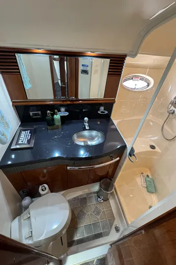  Yacht Photos Pics 2004 Sea Ray 500 Sundancer bathroom with sink, toilet, and shower.