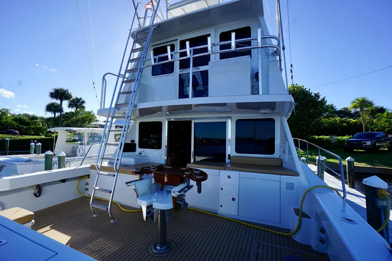 Fifth Day Yacht Photos Pics Luxury Venturer 44 yacht from 2000, featuring spacious deck and modern amenities.