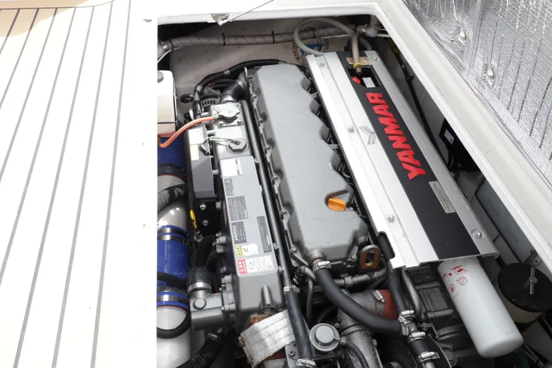 Fifth Day Yacht Photos Pics Engine compartment of a 2000 Venturer 44 boat with Yanmar engine.