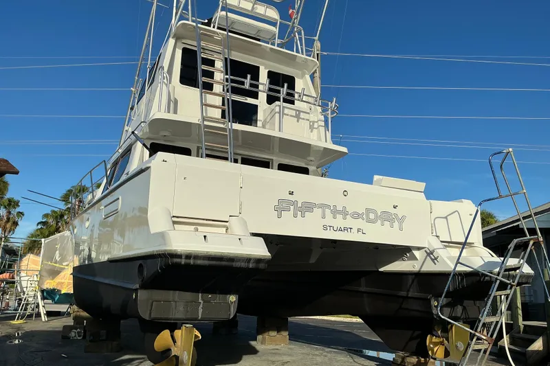 Fifth Day Yacht Photos Pics Voyager 44 yacht from 2000, named "Fifth Day," docked in Stuart, FL.
