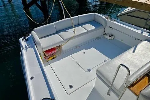 Maestro Yacht Photos Pics 2006 Lyman-Morse 38 Jet Boat with spacious seating and sleek design.