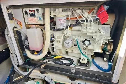 Maestro Yacht Photos Pics Engine compartment of 2006 Lyman-Morse 38 Jet Boat, showcasing mechanical components and wiring.