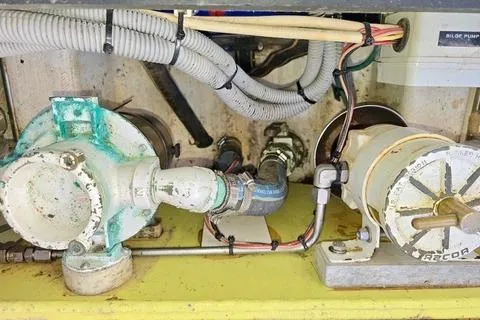 Maestro Yacht Photos Pics Engine compartment of 2006 Lyman-Morse 38 Jet Boat, showing mechanical components and wiring.