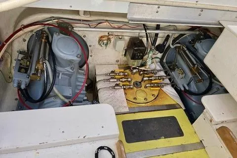 Maestro Yacht Photos Pics Engine compartment of 2006 Lyman-Morse 38 Jet Boat, showcasing mechanical components and wiring.