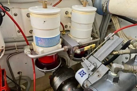 Maestro Yacht Photos Pics Engine components of a 2006 Lyman-Morse 38 Jet Boat, featuring dual fuel filters.