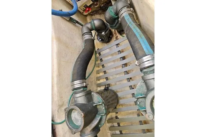 Maestro Yacht Photos Pics Engine compartment of 2006 Lyman-Morse 38 Jet Boat with hoses and fittings.