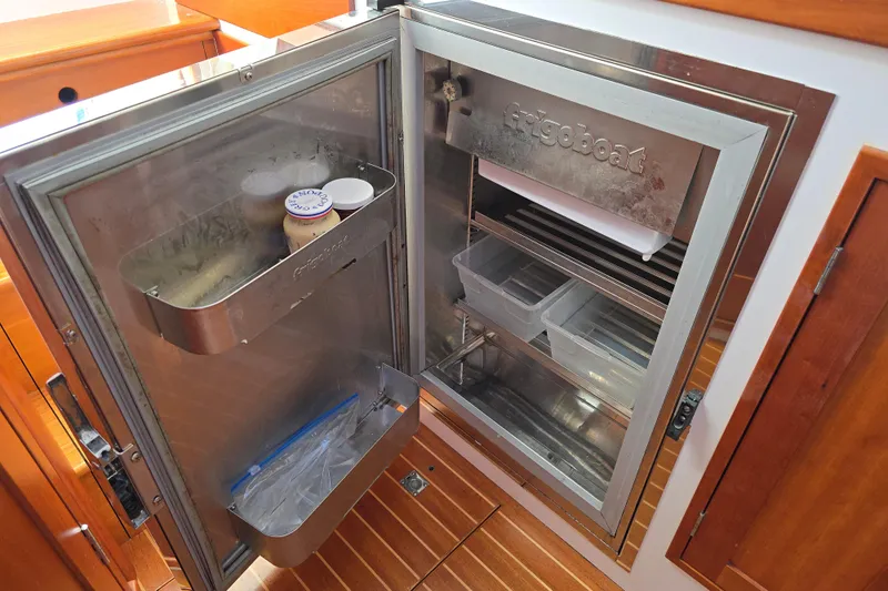 Maestro Yacht Photos Pics Open stainless steel fridge on 2006 Lyman-Morse Monhegan 38 - Twin Jet boat.