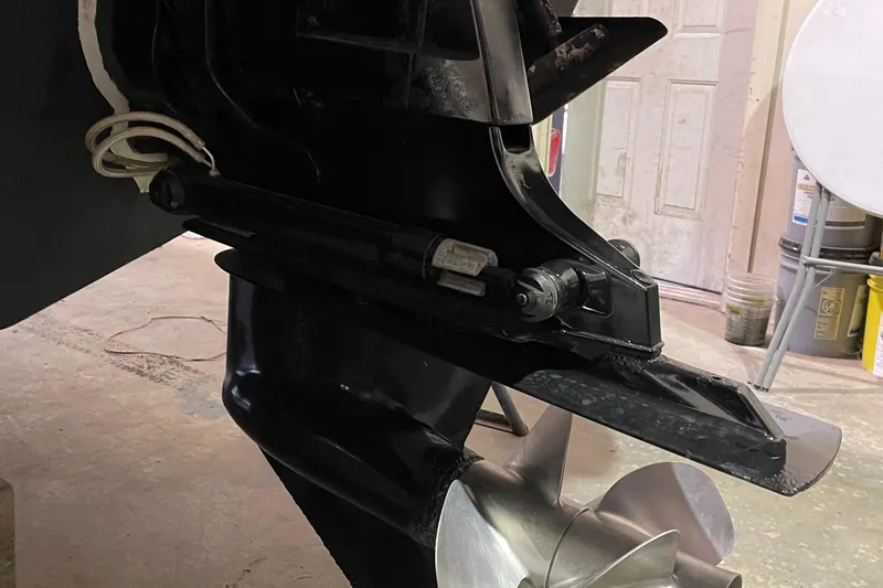  Yacht Photos Pics 2014 Formula 350 Sun Sport boat propeller and drive system in a garage setting.