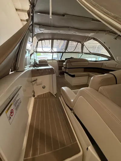  Yacht Photos Pics 2014 Formula 350 Sun Sport interior with beige seating and sleek design.