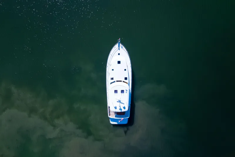  Yacht Photos Pics Aerial view of 2022 Sabre 48 Salon Express yacht on calm water.
