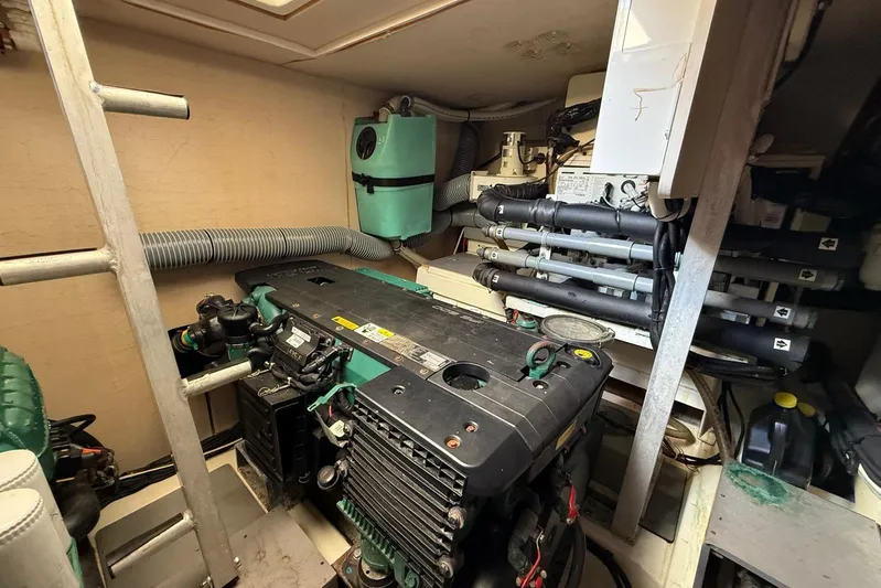 50 Prestige Flybridge Yacht Photos Pics Engine room of 2013 Prestige 50 Flybridge yacht, showcasing mechanical components and systems.