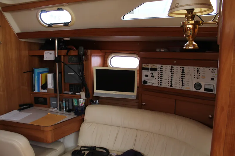 Cuckoo's Nest II Yacht Photos Pics Interior of a 2002 Catalina MkII yacht with navigation station and control panel.