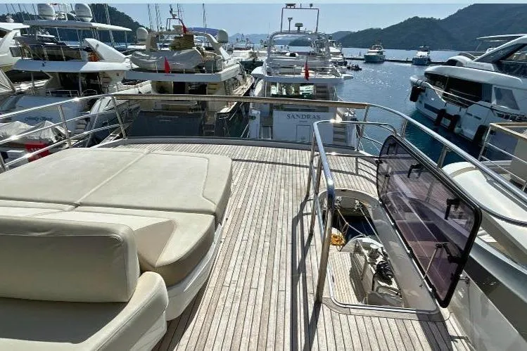  Yacht Photos Pics Luxurious 2020 Princess Y78 yacht deck with scenic marina view.