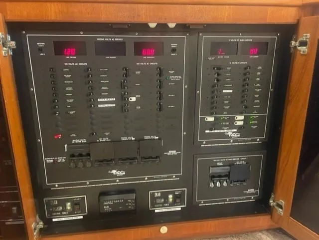 Dry-hydro Yacht Photos Pics Electrical control panel inside a 1990 Viking Convertible boat.