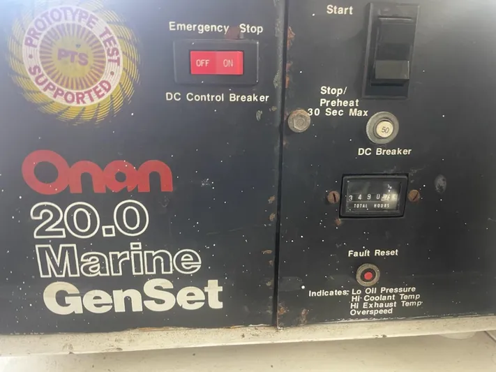 Dry-hydro Yacht Photos Pics Onan 20.0 Marine GenSet control panel with emergency stop and fault indicators.