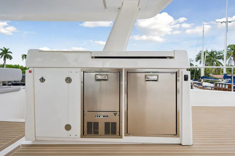 Euphoria Yacht Photos Pics Outdoor kitchen on 2024 Leopard 53 Powercat yacht with stainless steel appliances.