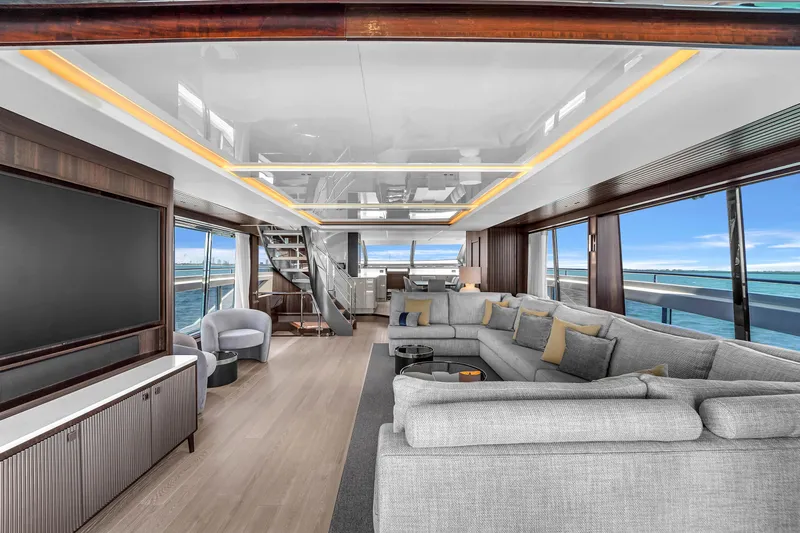 Worth The Wait Yacht Photos Pics Luxurious interior of 2024 Sunseeker Ocean 182 yacht with modern furnishings and ocean views.