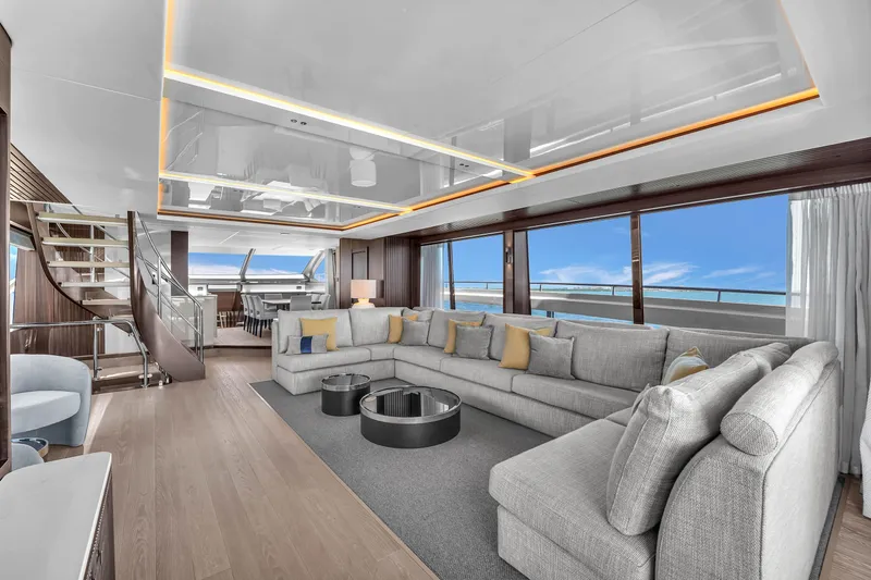 Worth The Wait Yacht Photos Pics Luxurious interior of 2024 Sunseeker Ocean 182 yacht with modern furnishings and panoramic windows.