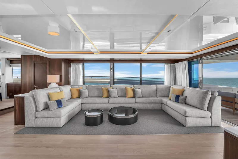 Worth The Wait Yacht Photos Pics Luxurious interior of 2024 Sunseeker Ocean 182 yacht with spacious seating and ocean view.