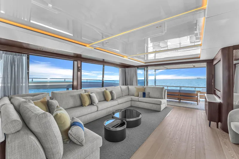 Worth The Wait Yacht Photos Pics Luxurious interior of 2024 Sunseeker Ocean 182 yacht with ocean view and modern furnishings.