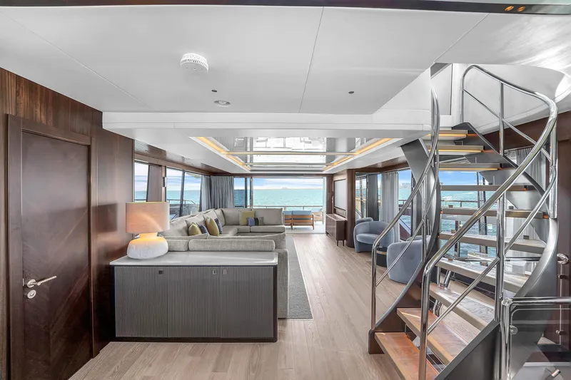 Worth The Wait Yacht Photos Pics Luxurious interior of 2024 Sunseeker Ocean 182 yacht with modern furnishings and ocean view.