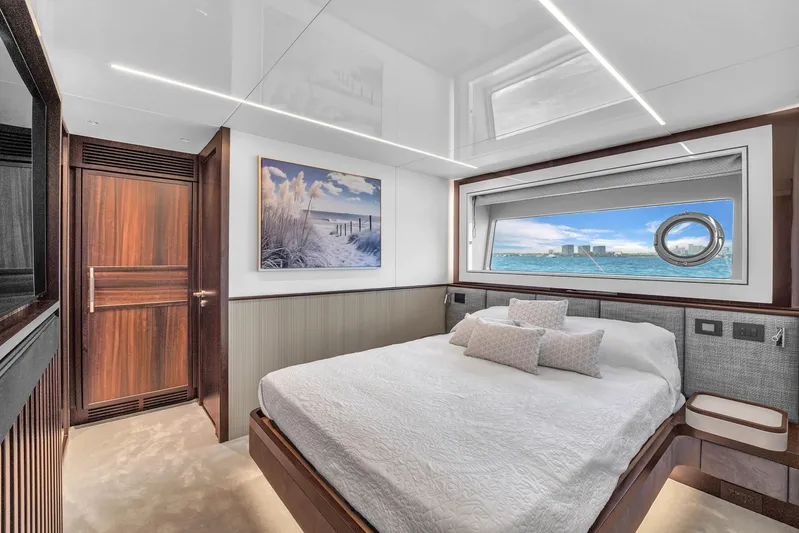 Worth The Wait Yacht Photos Pics Luxurious bedroom interior of 2024 Sunseeker Ocean 182 yacht with ocean view.
