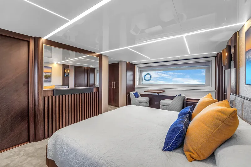 Worth The Wait Yacht Photos Pics Luxurious 2024 Sunseeker Ocean 182 yacht interior with modern bedroom and ocean view.